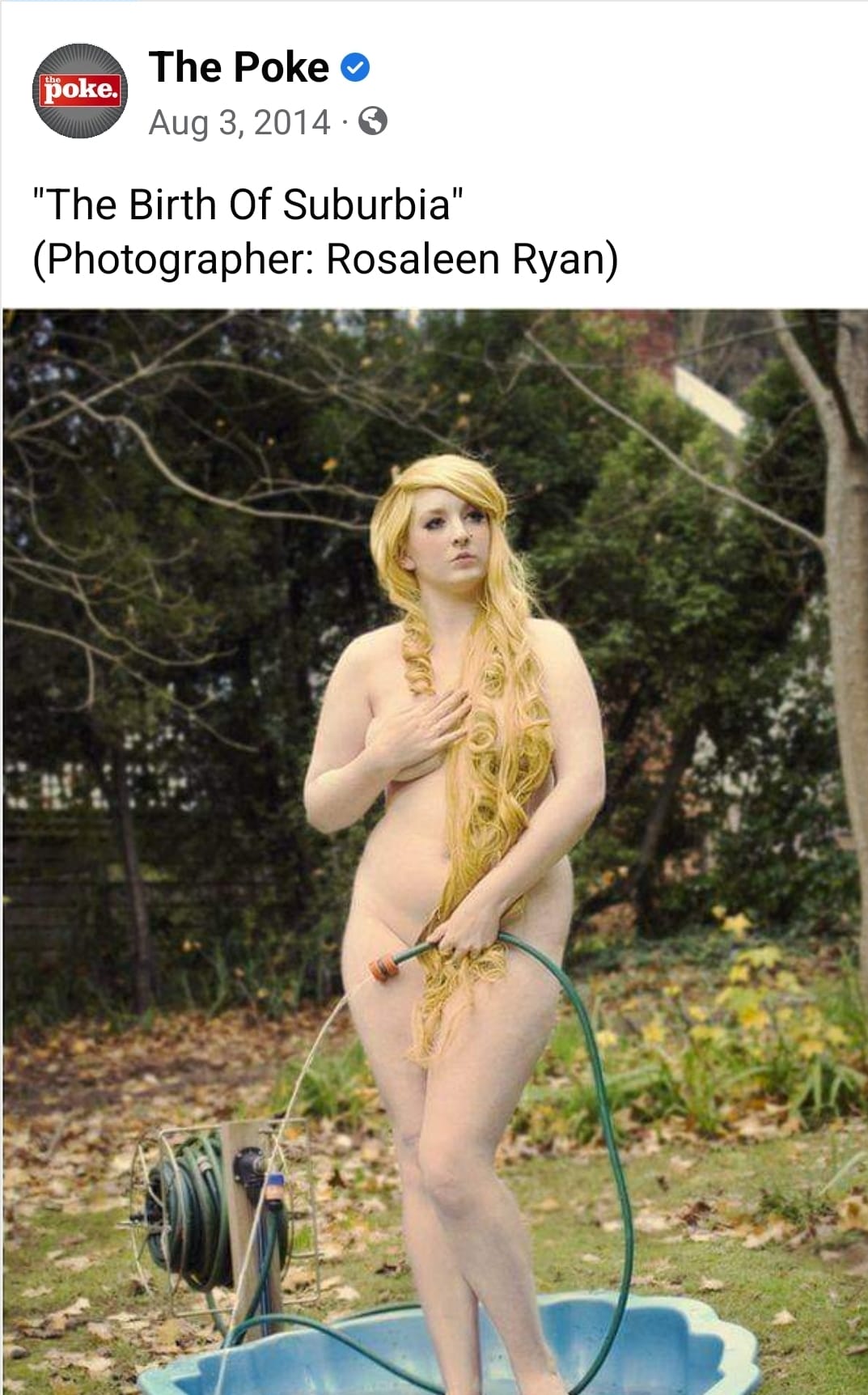 The meme is a photo of a woman in a provocative pose, standing in a backyard with a hose in her hand. The image is captioned "In 2D" and "3D" and "2D" and "3D" are written on the top and bottom of the image, respectively. The meme is likely referencing the 1999 film "The Matrix" and the idea that the woman is somehow being transformed or manipulated in a way that is reminiscent of the film's "bullet time" effects.